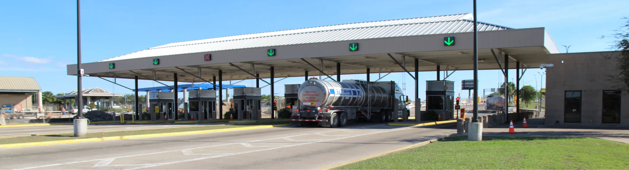 Truck crossing through toll booths at Veterans International Bridge